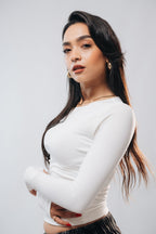 HALF-ZIP NECKLINE LONG SLEEVE